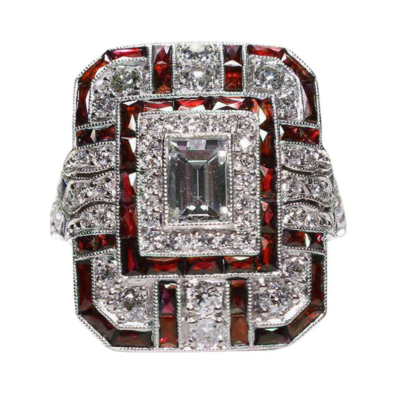 Artificial zircon ring with slightly set diamonds