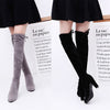 Above-knee boots with high heels