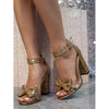 Shiny bow-knotted high-heeled sandals