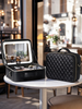 The makeup bag comes with a mirror and a lamp
