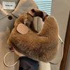 Carry a small crossbody bag